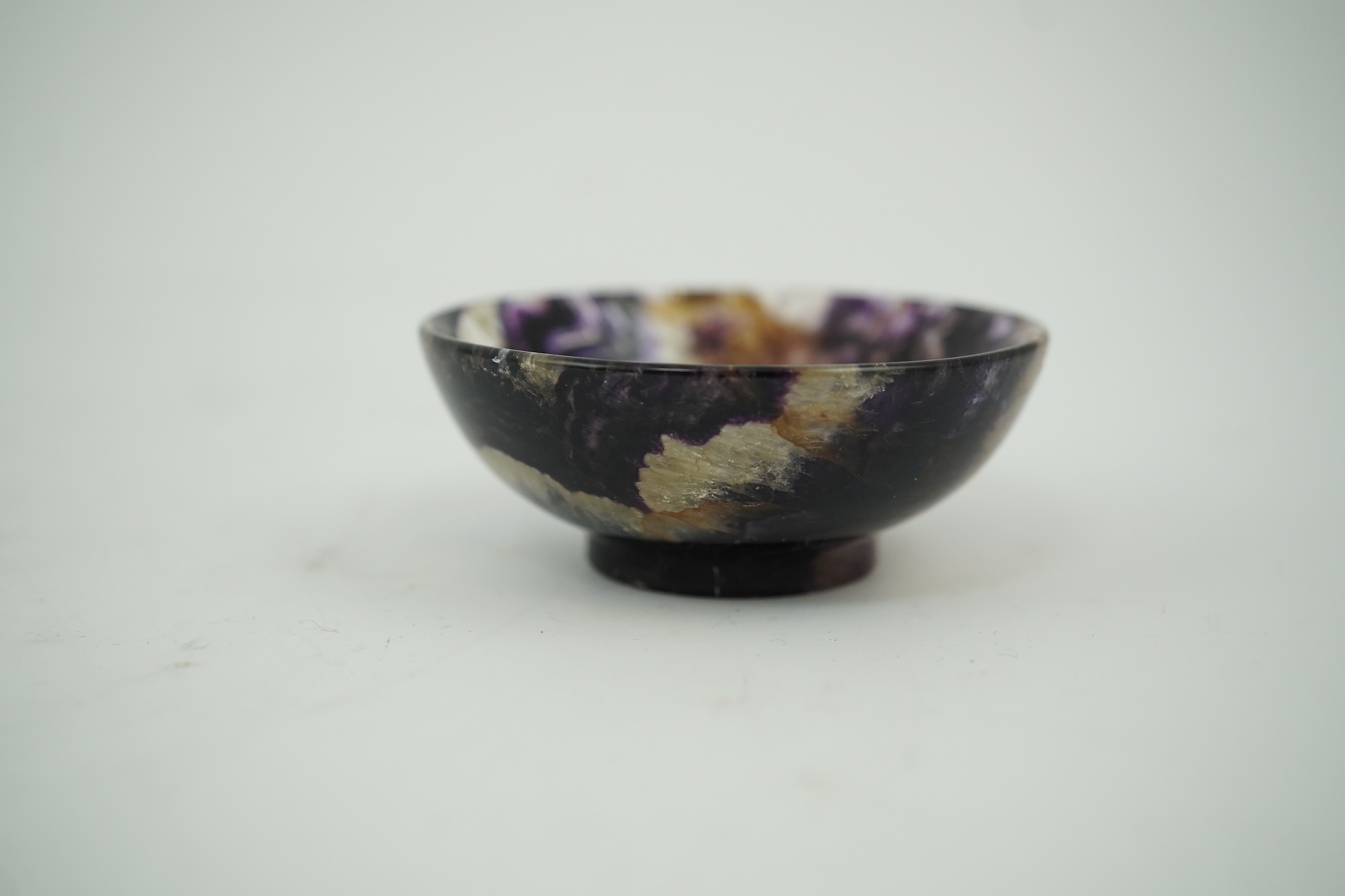 A small turned Blue John bowl, 6cm diameter. Condition - good